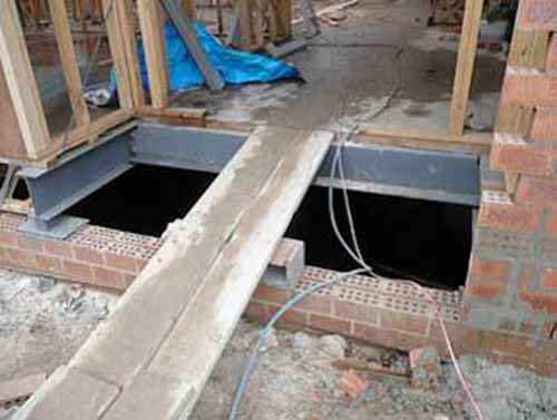 Unsafe floor opening exposes workers to fall hazards